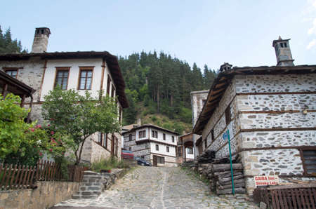 The old stone houses of village of Shiroka Laka in the Rhodope Mountains in Bulgariaの写真素材
