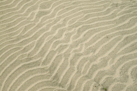 Beautiful wavy beach sand closeup
