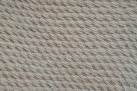 New light ecru woven wool fabric close up