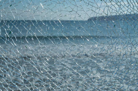 Broken glass with many small pieces close up