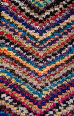 A carpet of many colorful pieces of fabric in Morocco close upの写真素材