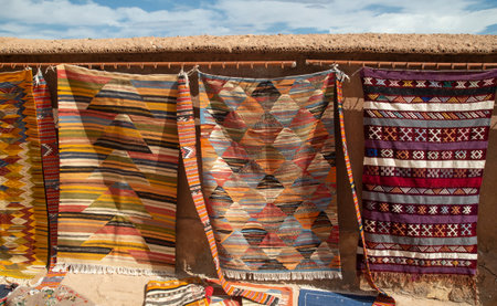 Many colorful woolen Berber carpet in Moroccoの写真素材