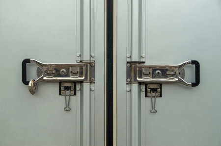 White steel Door safety lock of Cargo Truck close upの写真素材