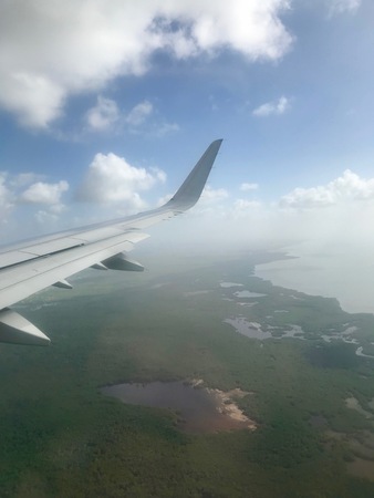View of Trinidad and Tobago from an airplane (Aerial perspective during the landing approach to Port of Spain)の写真素材