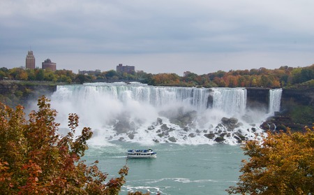 Beautiful and impressive panorama of the Niagara falls in Ontario (Canada) on a bright autumn dayの写真素材