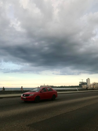 Sunset scenery at the Malecon streets in Havana (La Habana), the capital of the Caribbean island of Cuba