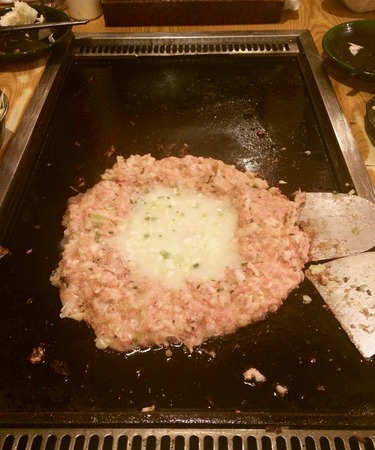 Okonomiyaki in Tokyo, Japan (Asia) for dinner in a restaurantの写真素材