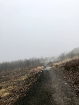 Colorful outdoor autumn scenery in the Geothermal area of Geyser on the cloudy afternoon in the mountains of Bl?sk?gabygg? on the Golden Circle (Reyjkavik)の写真素材