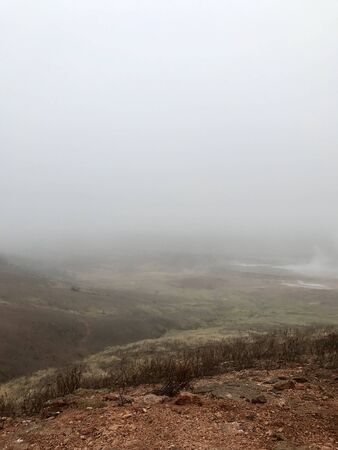 Colorful outdoor autumn scenery in the Geothermal area of Geyser on the cloudy afternoon in the mountains of Bl?sk?gabygg? on the Golden Circle (Reyjkavik)の写真素材