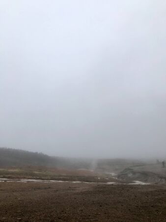 Haukadalur, the home of some of the most famous sights in Iceland: the geysers and other geothermal features which have been developed on the Laugarfjall rhyolitic dome.の写真素材