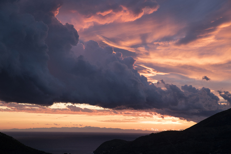 A very cloudy and warm sunset in levanto, cinque terre - italy - after a rain storm の写真素材