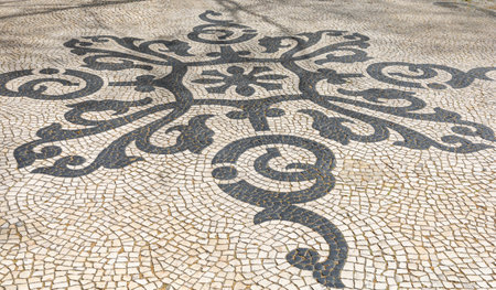 Mosaic sidewalk in the streets of Lisbon, Portugal.の写真素材