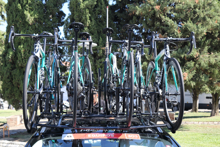 Ejea de los Caballeros, Spain - September 13, 2018: A close view of bicycles mounted on the rack of a team cars parked at the start of the Vueltaのeditorial素材