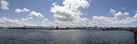 La Coruna, Spain - July 29, 2017: The piers of La Corua marina sea port with many sailing boats and...