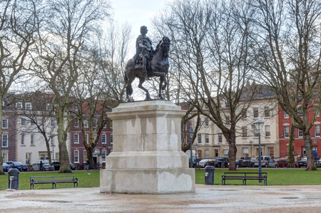 Equestrian statue of William III in Queen Square in Bristol, United Kingdoms, just after a storm in a winter dayのeditorial素材