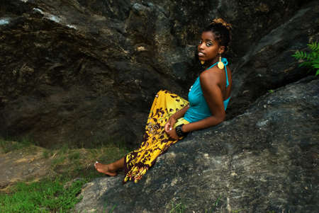african american sits on rock
の写真素材