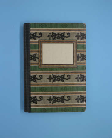 A note book isolated on blue
