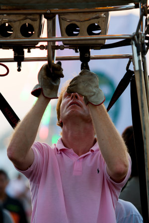 Pilot heat to inflate the balloon before fly in hot air Thailand International Balloon Festival 2009のeditorial素材