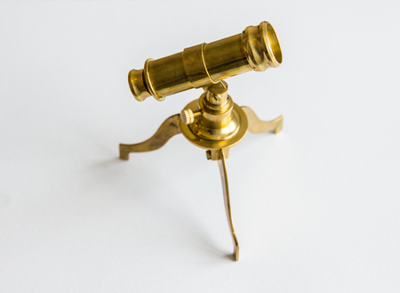 Vintage telescope on white backgroundの写真素材