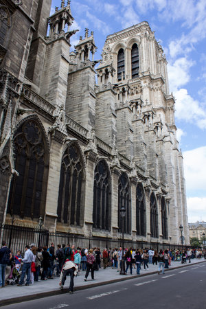 Paris, France - July 23, 2011: Tourist waiting in line to visit Notre Dame cathedralのeditorial素材