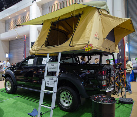 Bangkok, Thailand - November 2, 2017: Car roof top extended tent on pick-up truck display in garden fairのeditorial素材