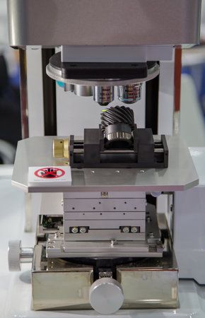 Bangkok, Thailand - November 22, 2017: Roughness evaluation of gear teeth surface by microscope in Metalex 2017のeditorial素材