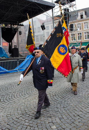 Bruges, Belgium - July 21, 2011: Veterans of world war 2 march in Bruges, Belgiumのeditorial素材