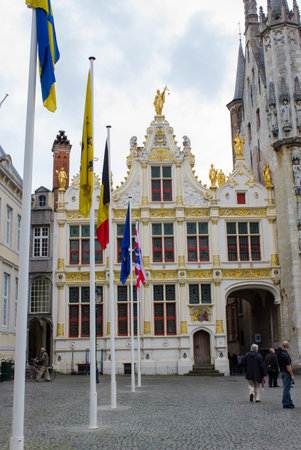 Bruges, Belgium - July 21, 2011: Medieval buildings along walkway in Bruges, Belgiumのeditorial素材