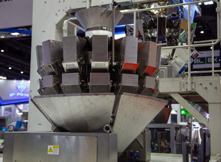Bangkok, Thailand - June 14, 2018: Multi-head Weigher Machine for sachets|chips snack display in...