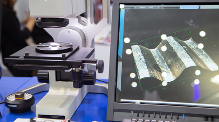 Digital microscope inspect measuring dimension of workpiece in lab