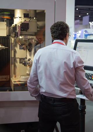 Industrial technician input data programing for Five axis CNC grinding machine