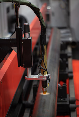 CNC pipe or tube cutting and beveling machine. Industrial metalworking