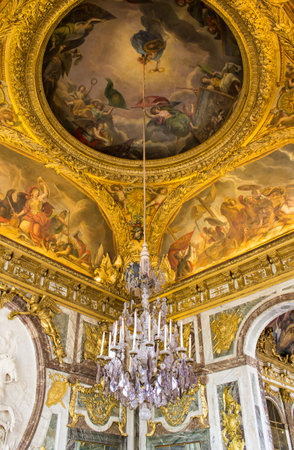 Versailles, France - July 24, 2011: Ceiling painting and chandelier hanging in the corridor of the Hall of Mirrors at Chateau de Versailles (Palace of Versailles) in Franceのeditorial素材