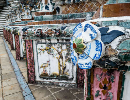 Ceramic tiles and stoneware detail decorated on temple at Wat Arun temple. Temple of Dawn.の写真素材