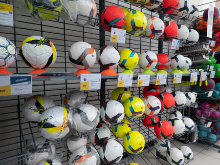Bangkok, Thailand - September 19, 2022:  Various football display on shelves in sport shop.