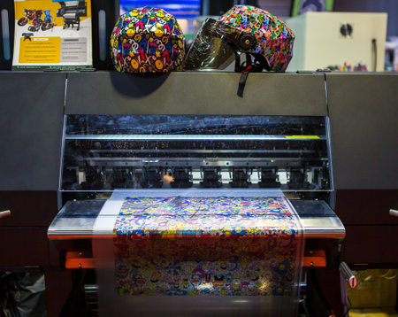 Bangkok, Thailand - March 31, 2023: Water transfer printing film helmet in Print Tech 2023のeditorial素材