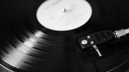 Close-up vintage vinyl record player. Retro audio equipment turntable.の写真素材