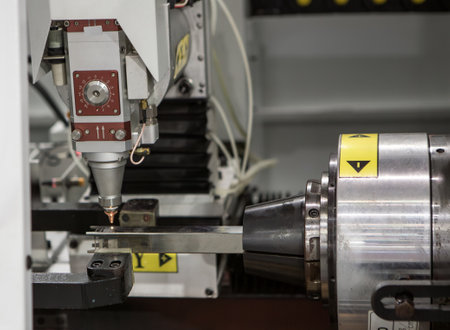 Pipe laser cutting machine. Industrial manufacture.