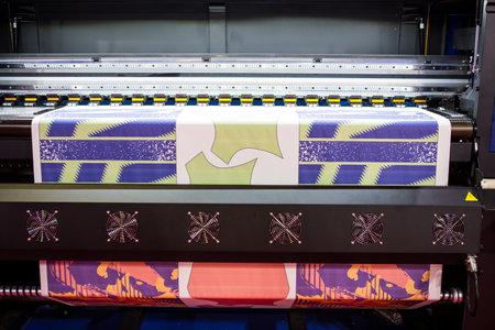Sublimation printer printing T shirt show in Garment and Textile Manufacturing Industry.