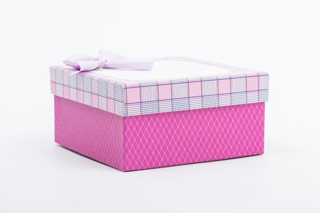 Pink gift box isolated on white backgroundの写真素材