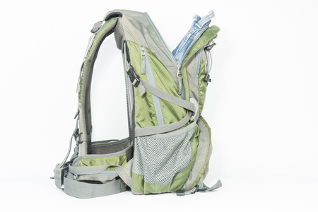 green backpack isolated on white backgroundの写真素材