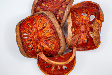 dried quince on white backgroundの写真素材