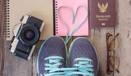 Travel planning concept, item of travel on wooden backgroundの写真素材