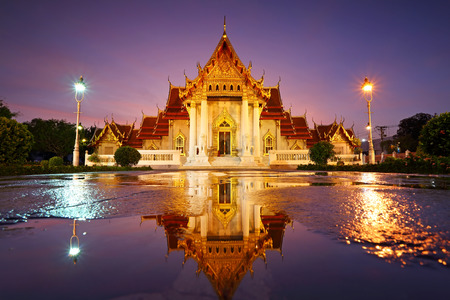 Beautiful water reflection of Wat Benjamaborphit or Marble Temple at twilight in Bangkok, Thailandの写真素材