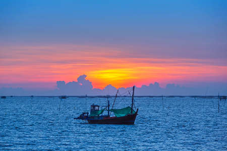 Fishing boat at sunset in the Gulf of Thailand. Fishing boat in the Gulf of Thailand.