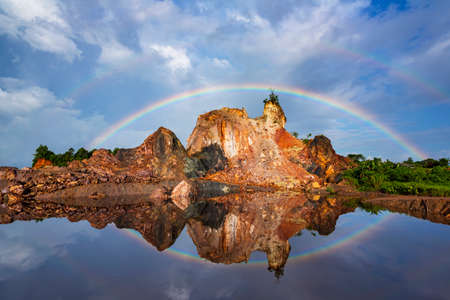Rainbow over the rock at Khao Sam Roi Yot National Park, Thailandの写真素材
