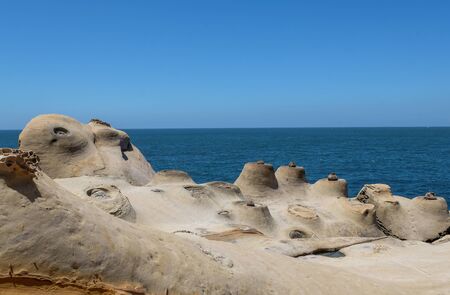 Taipei, Taiwan- July 19, 2018 -Natural landscape in Yehliu Geopark, New Taipei City, Taiwan. The unique geological formations including the iconic "Candle Rock".のeditorial素材