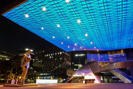 Busan, South Korea - 1 April, 2019:Night shot of Busan Cinema Center is the official venue of the Busan International Film Festival (BIFF) , which is a major world film festival.のeditorial素材
