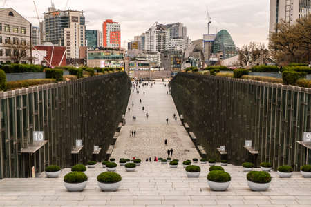 Seoul South, Korea - April 10 ,2019:Students walking through Ewha Womans University main library building at evenning time - very prestigious school in Seoul, South Korea.のeditorial素材