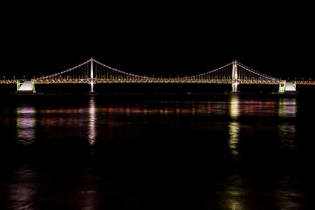Busan, South Korea - Mar 31, 2019 : Busan Gwangan bridge taken from Gwangalli beach in night time.のeditorial素材
